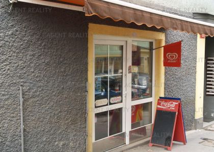Pronájem obchodní prostor 94m2 v přilehlé ulici u hlavní komunikace MHD P6-Hradčanská
