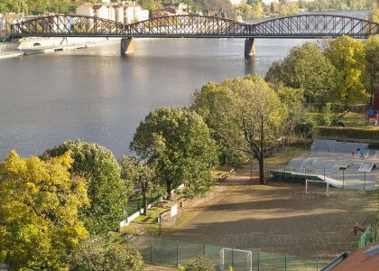  Prodej nového podkrovního bytu 2+kk, 61m2 u Vltavy s krásnou vyhlídkou na Vyšehrad.