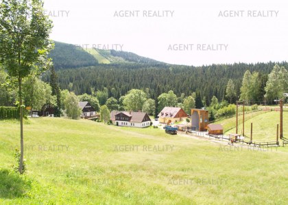 Prodej zavedeného pensionu 750m2 s obchodními prostory 200m2 a s dobrým výnosem v centru Harrachova.